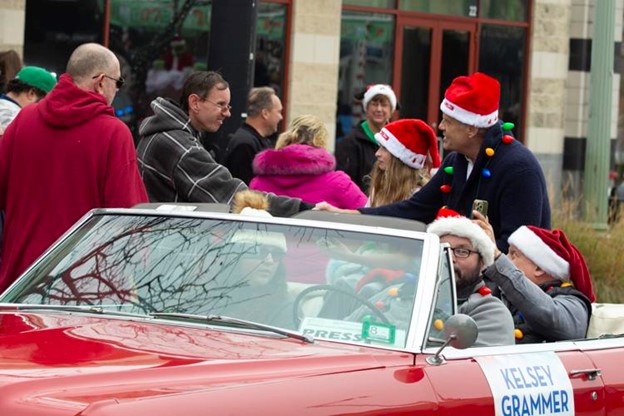 Egg Harbor Township resident Michael Kern, second from left, shakes hands with Kelsey Grammer, grand marshal, during Saturday’s parade. Matthew Strabuk Photos, Staff Photographer.